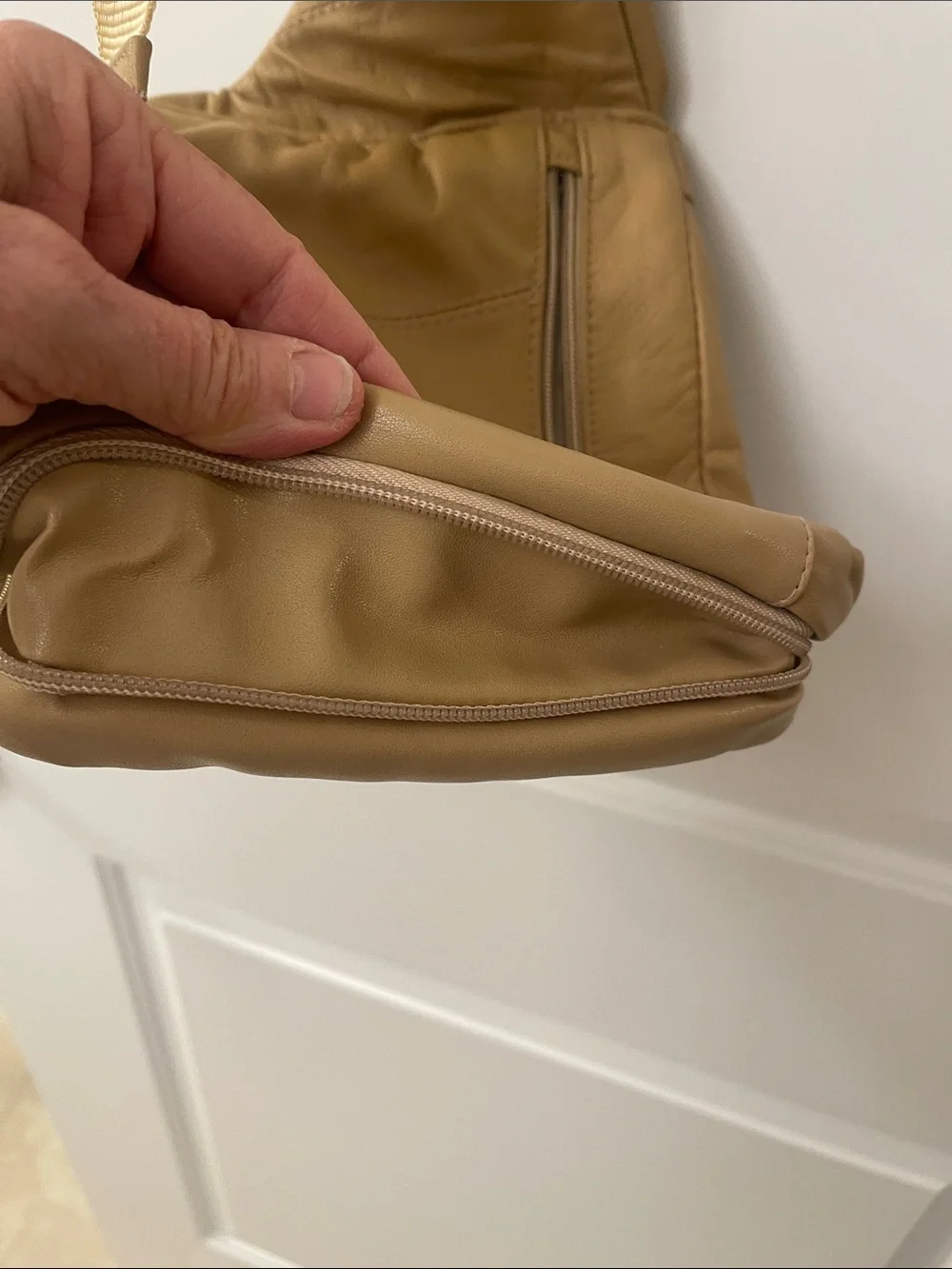 Buxton tan crossbody sling backpack
